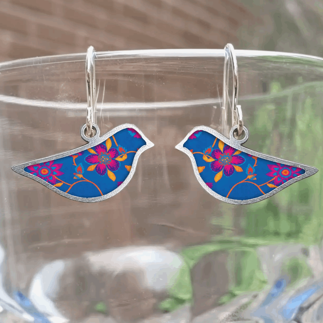 Blue and pink floral bird earrings