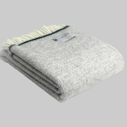 Illusion grey throw with green stripe