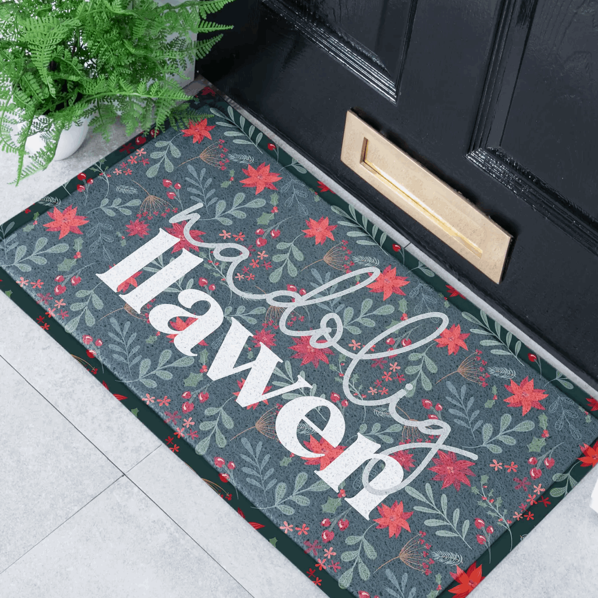 Red and green Nadolig Llawen noodle doormat